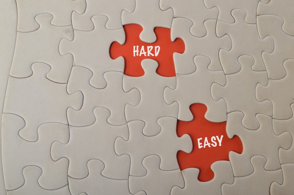 Missing jigsaw puzzle with text HARD and EASY.